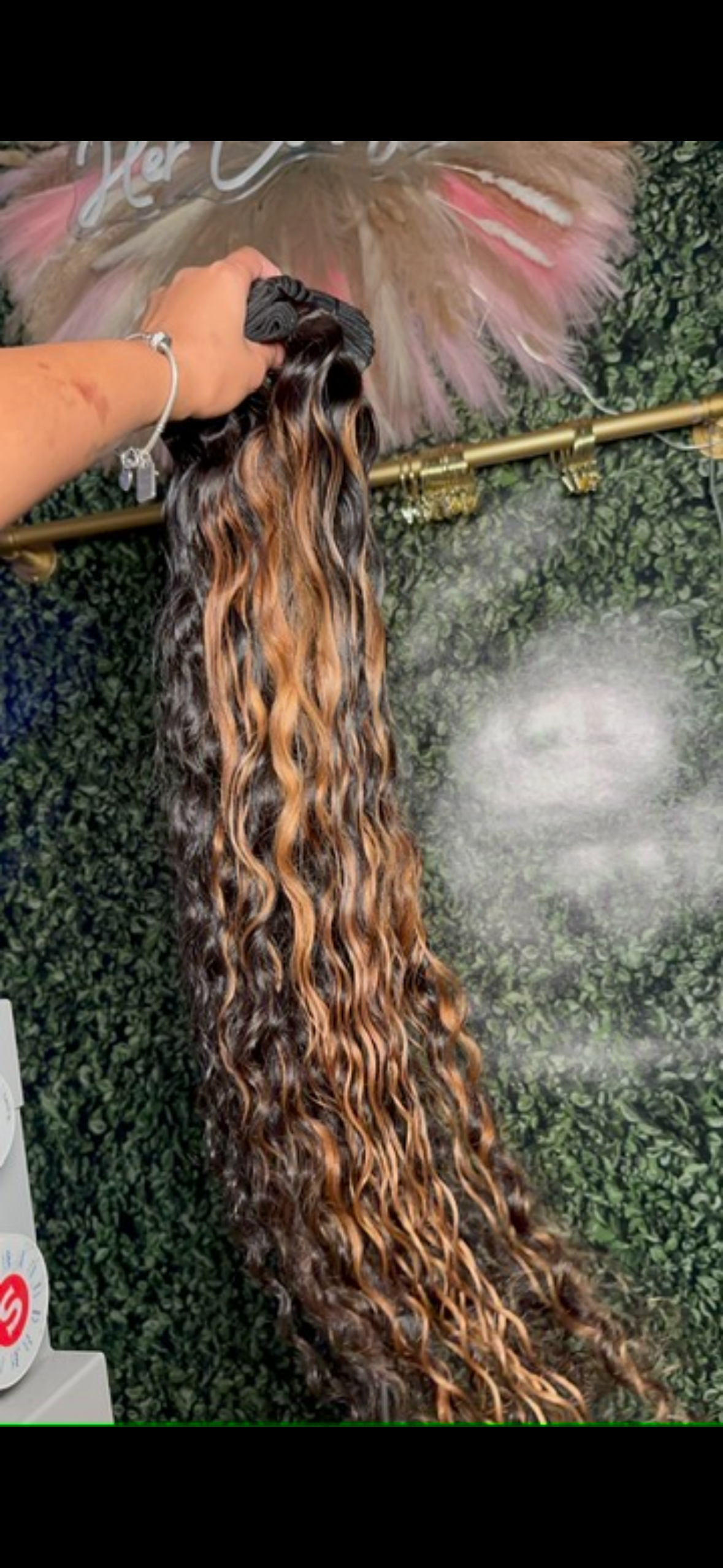 Her Classy Curly Extensions