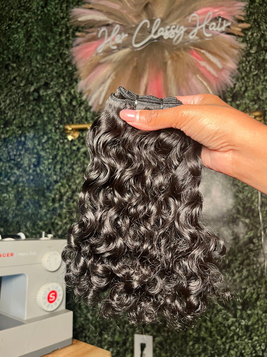 Her Classy Curly Extensions