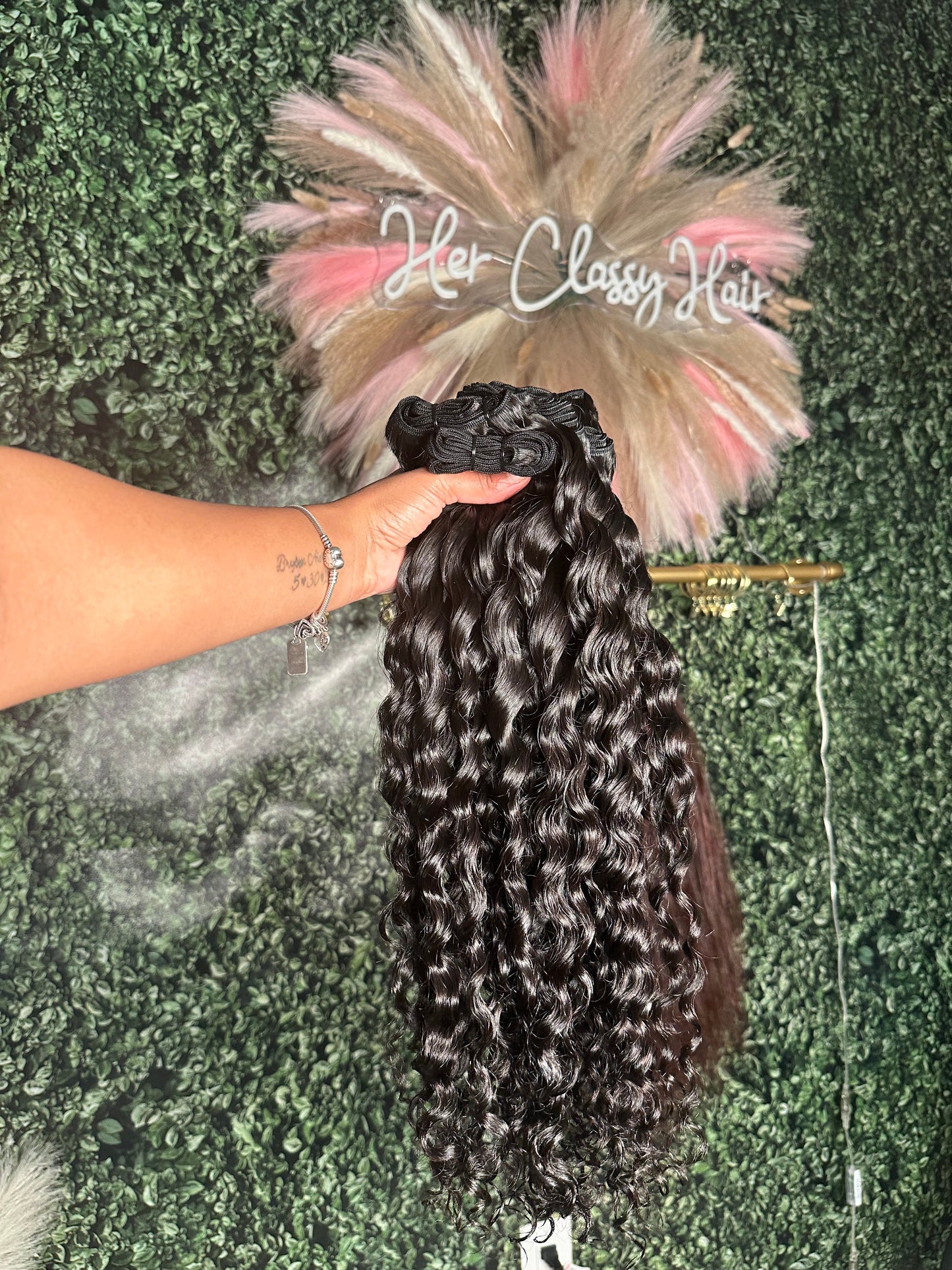 Her Classy Curly Extensions